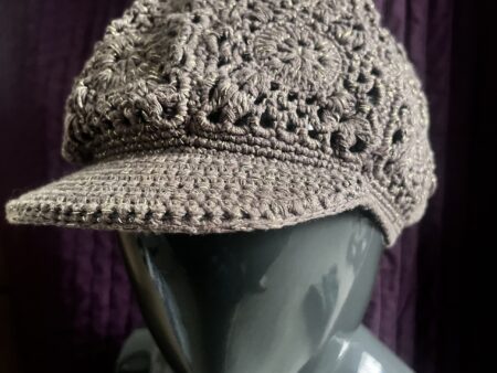 Crochet style peaked hat